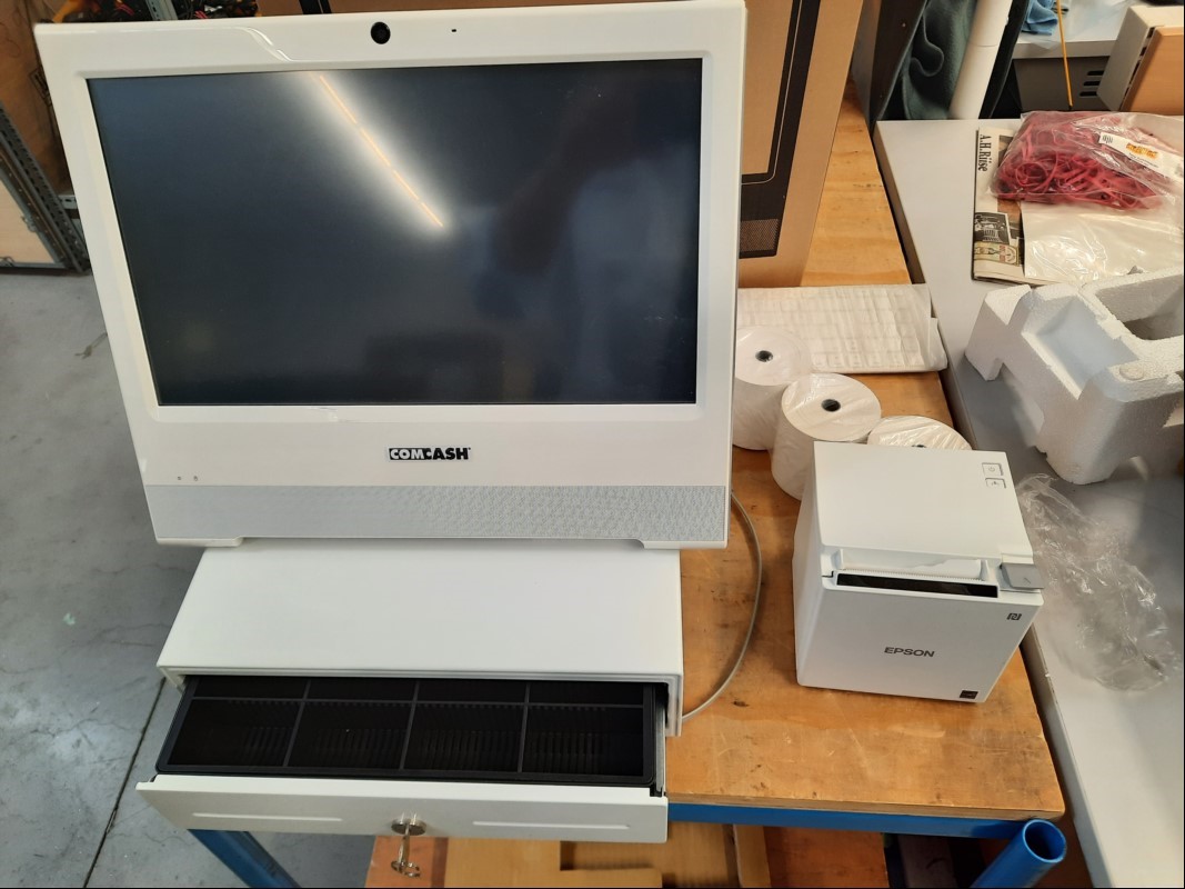 Teile aus ComCash Kassensystem mit Comhair Shuttle AIO Touch-PC, inkl. Netzteil (Gerät lässt sich einschalten und bedienen,Touch-Funktion ok, keine weiteren Tests durchgeführt), Epson TM-m30 Model: M335A, inkl. Netzteil (Gerät lässt sich einschalt...