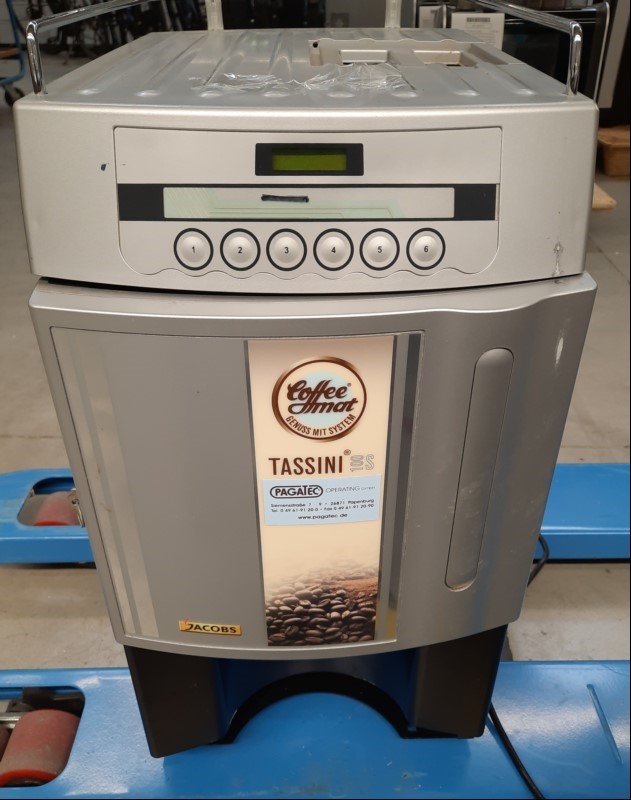 Kaffeeautomat  Tassini 100S defekt, zur Ersatzteilgewinnung, keine Funktionen 1 Schlüssel ist vorhanden, Zustand  siehe Bilder, keine Garantie auf Funktion und Vollständigkeit, alle Angaben ohne Gewähr (ID=V12-00)