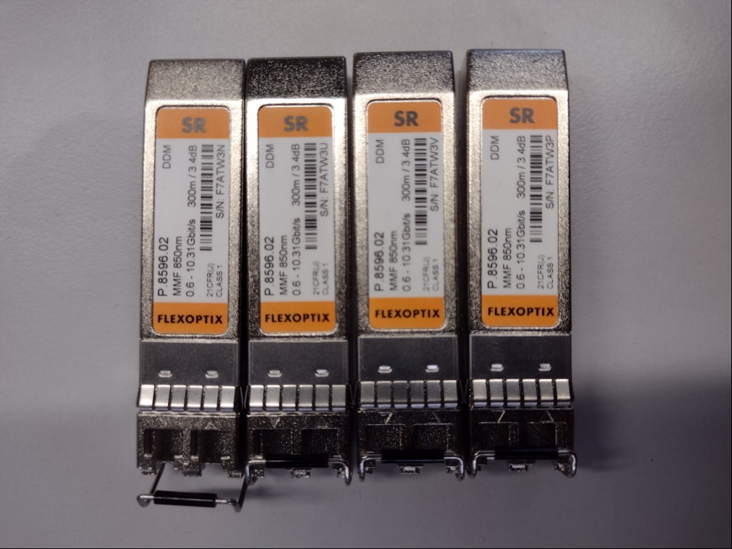 4x FLEXOPTIX Transceiver P.8596.02 SR, Seriennummer: F7ATW3U, F7ATW3V, F7ATW3N, F7ATW3P, 10 GbE, 850nm, ungeprüft (ID=V02-22)